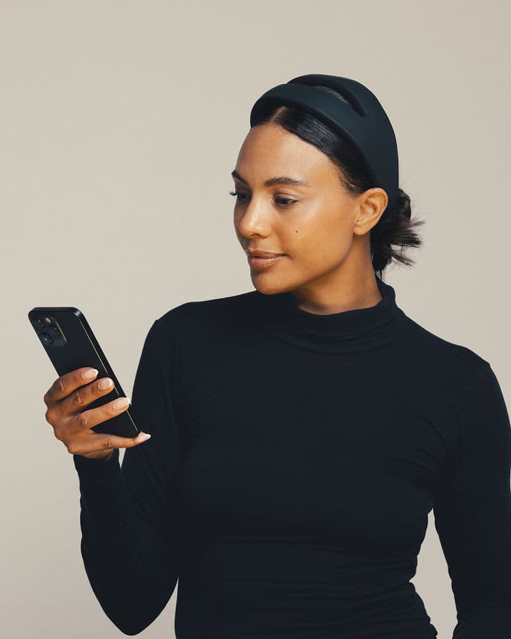 Woman using a Samphire device